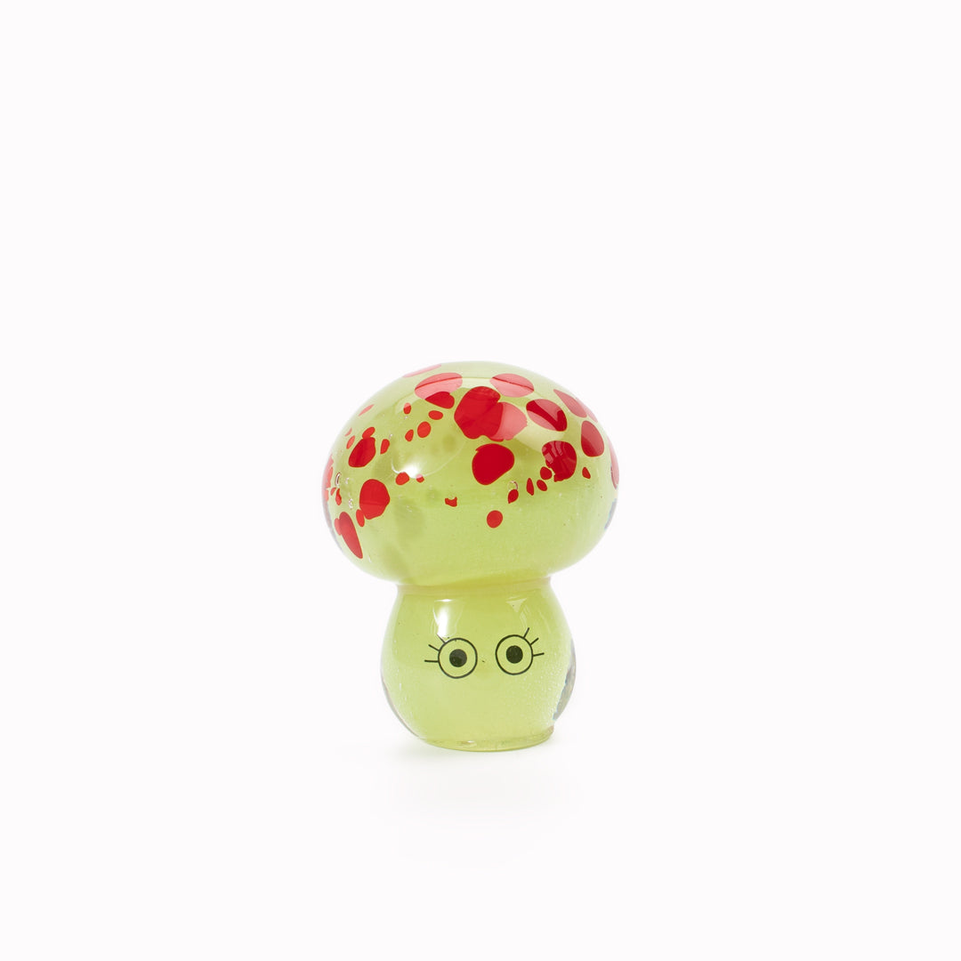 Shroom Crystal Blob is formed by dipping and/or rolling molten (hot!) clear glass into smaller chunks of brightly coloured glass droplets, then expertly shaping into weird and wonderful forms.