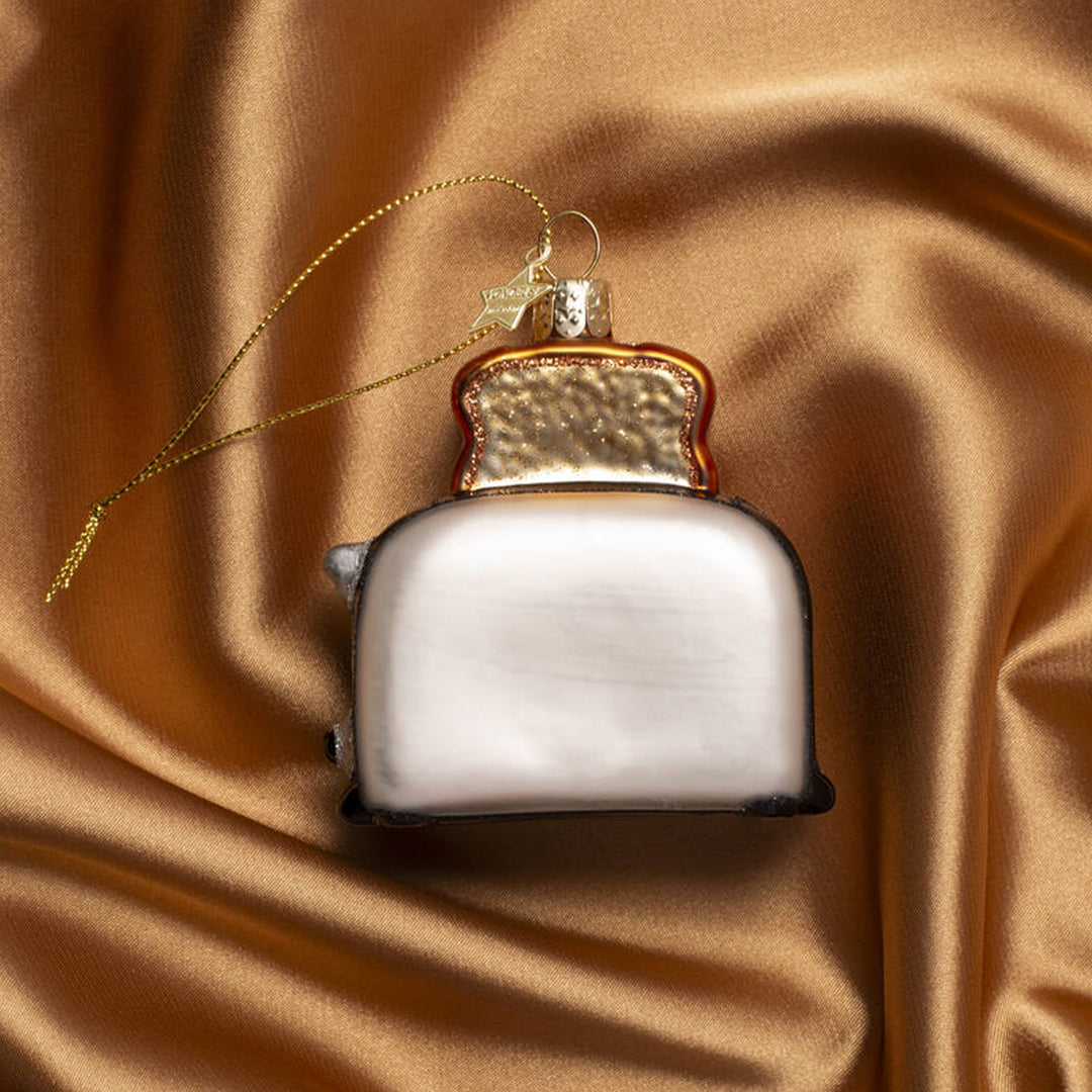 Inject some sparkly fun into your Christmas tree with this hand painted and mouth blown glass Toaster&nbsp;ornamental Christmas tree decoration by Vondels.