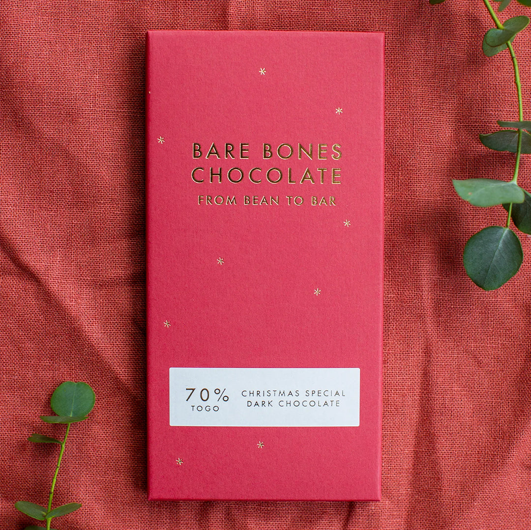 The 2024 Christmas Special chocolate bar by Bare Bones is a single-origin Togo 70% dark chocolate with appropriately festive taste notes of yule log and red berries.