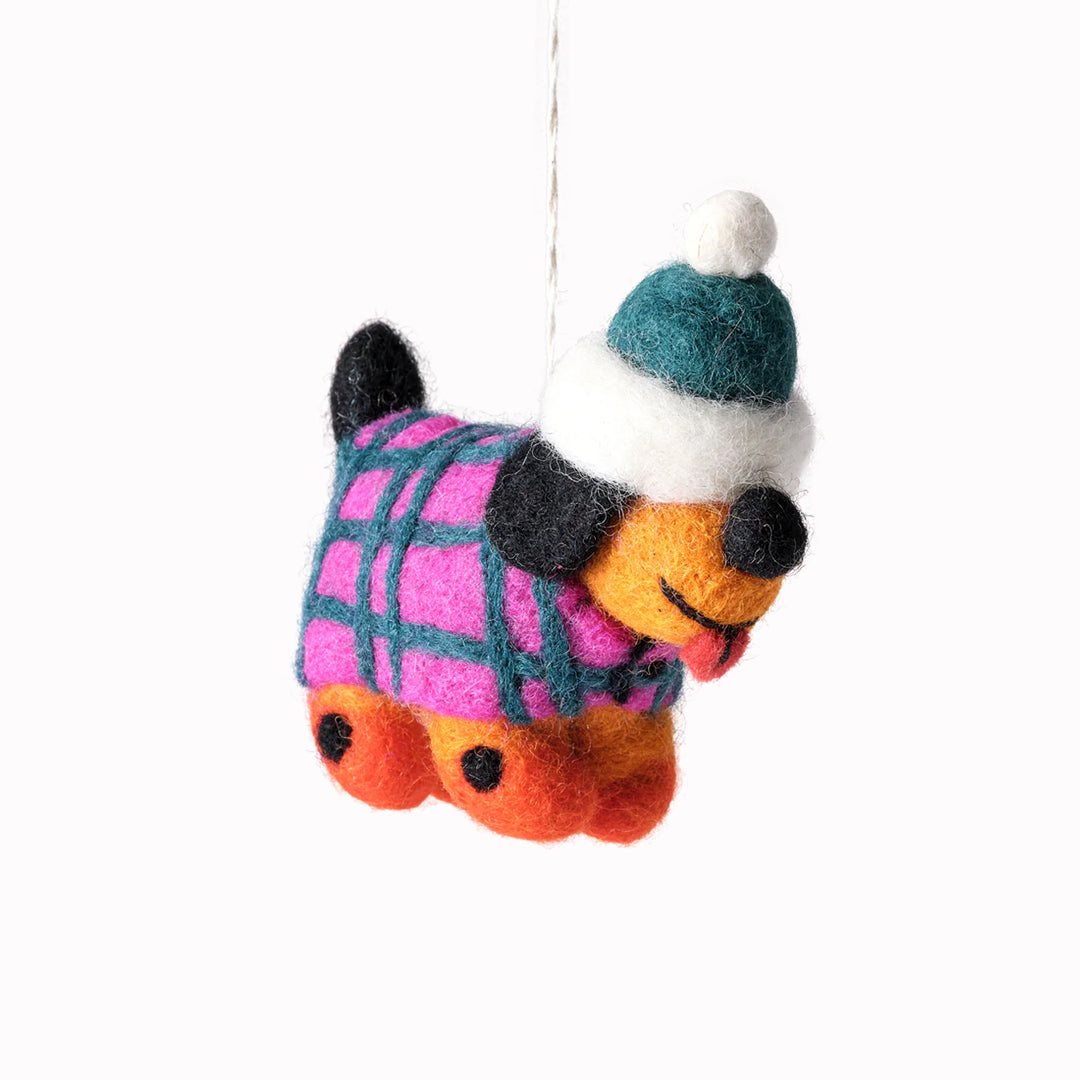 Cute, cuddly, and Christmassy - Toots the dog with a winter jacket on! A playful felted Christmas tree decoration designed by Cari Vander Yacht.
