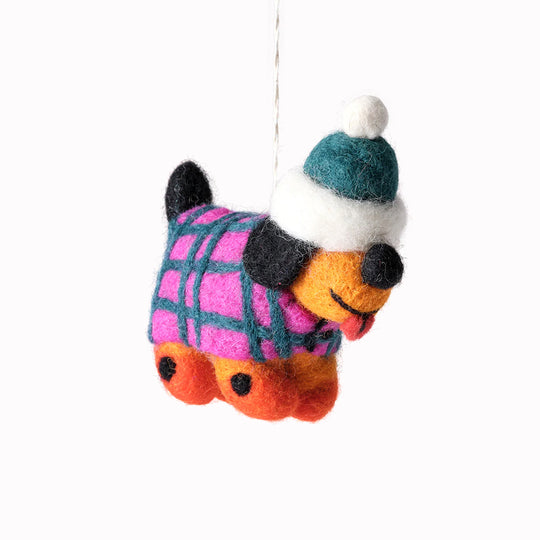 Cute, cuddly, and Christmassy - Toots the dog with a winter jacket on! A playful felted Christmas tree decoration designed by Cari Vander Yacht.