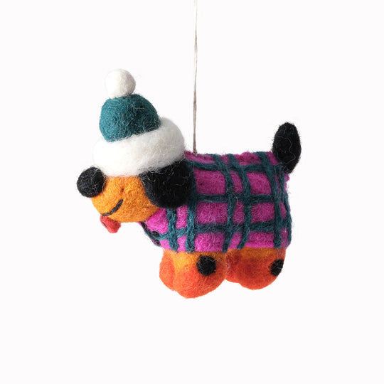 Cute, cuddly, and Christmassy - Toots the dog with a winter jacket on! A playful felted Christmas tree decoration designed by Cari Vander Yacht.