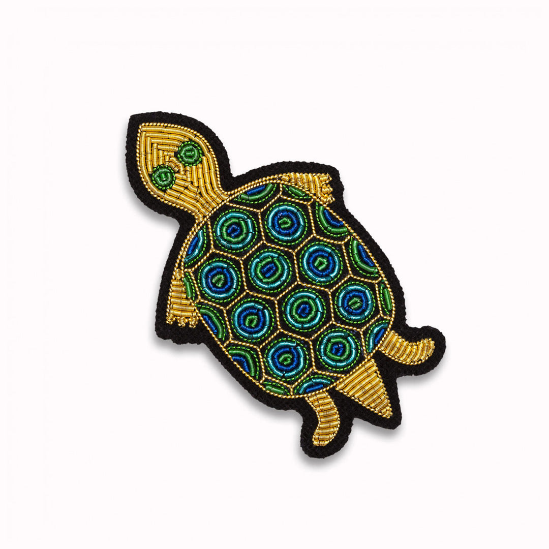 Tortoise is a hand embroidered decorative brooch from French Accessory brand Macon et Lesquoy. A celebration of slowing down the pace and taking in the view.