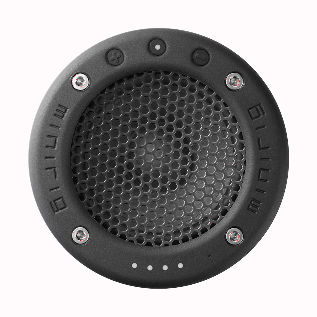 Top View - The Minirig Mini 4 in Ultra Black is a portable Bluetooth speaker that represents the latest innovation in audio technology. Crafted in Bristol, UK, this speaker is the result of over a decade of design evolution, offering a robust anodized aluminium and high-impact ABS construction.