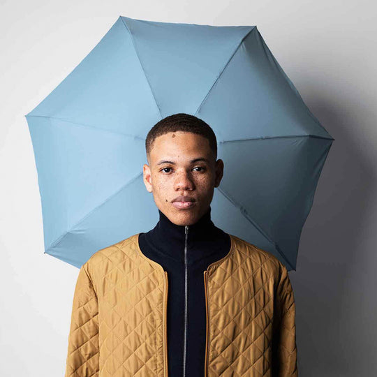 Victor is a brightly coloured, stone blue, ultra light-weight folding umbrella by Anatole, Paris.