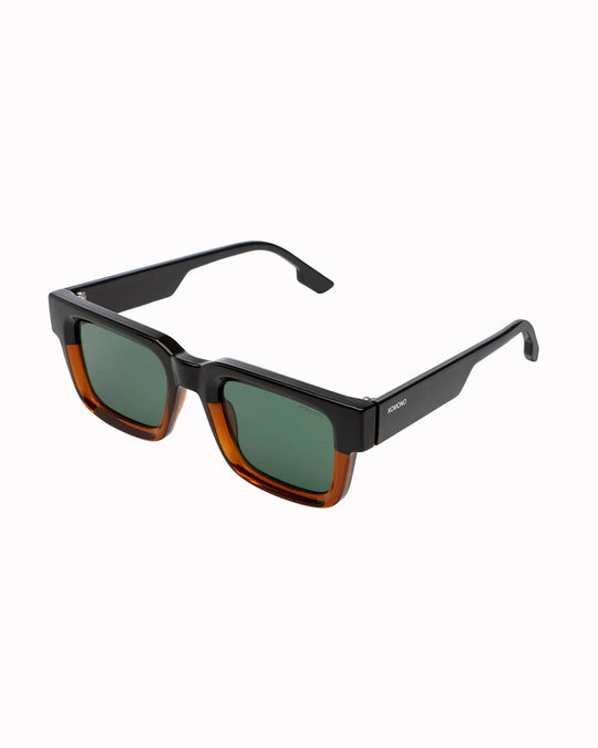 The Victor pairs a defined square silhouette with a slimmer acetate profile, giving the frame a cleaner, more controlled look than heavier oversized styles.