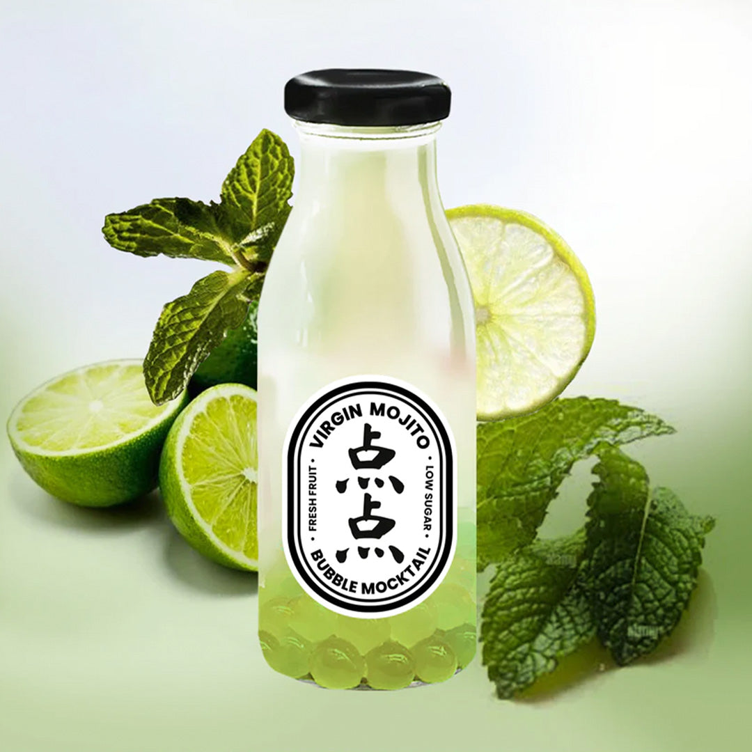 Virgin Mojito Bubble Mocktail Bubble Tea from Dotdot is brewed with with fresh mint and Lime puree and then topped with lime popping bubbles for fun juicy bursts in your mouth. Lifestyle image