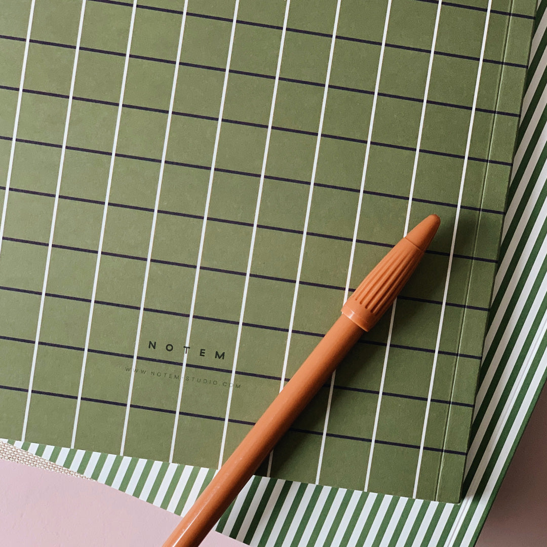 Green Grid Notem Vita Medium Notebook is a versatile and stylish notebook that can be used for various purposes. Whether you want to write to do lists, notes, or a journal, this notebook has you covered. It has 80 pages of high-quality Scandinavian paper with a lined layout.
