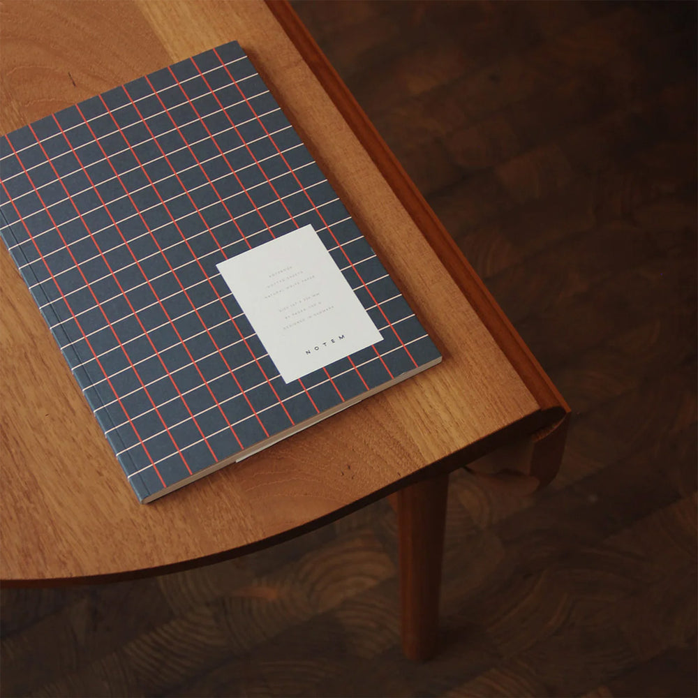 On Table - The Notem Vita Medium Notebook is a versatile and stylish notebook that can be used for various purposes. Whether you want to write, sketch, doodle, or bullet journal, this notebook has you covered. It has 80 pages of high-quality Scandinavian paper