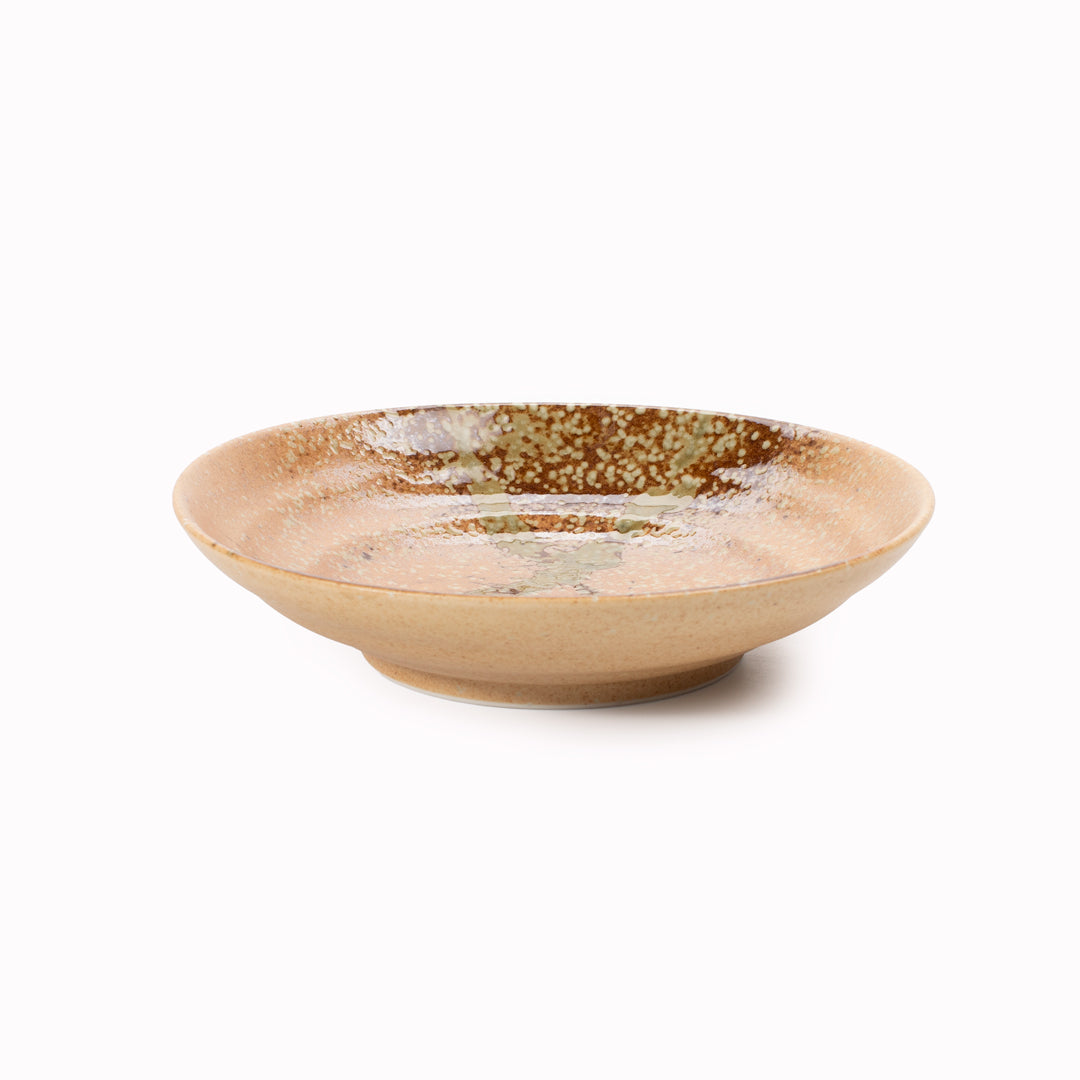 Shallow noodle bowl featuring a rustic glaze with striking green splash. Diameter 225mm and height approx 50mm.