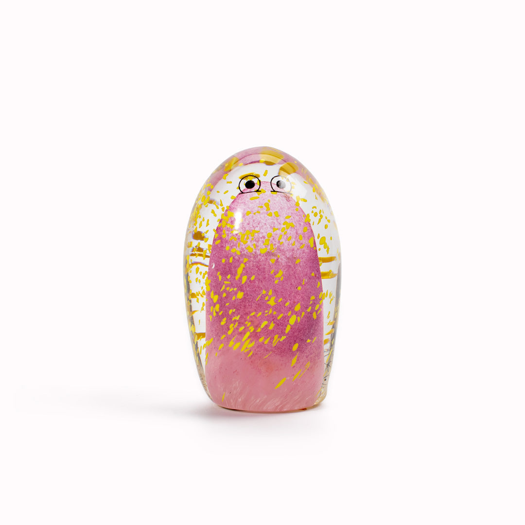 Totem Crystal Blob is formed by dipping and/or rolling molten (hot!) clear glass into smaller chunks of brightly coloured glass droplets,