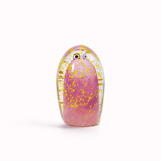 Totem Crystal Blob is formed by dipping and/or rolling molten (hot!) clear glass into smaller chunks of brightly coloured glass droplets,