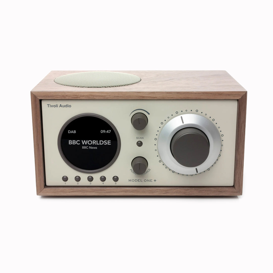 The Model One+ offers a sophisticated blend of classic design and modern audio technology, perfectly suited for any setting. This versatile table radio provides comprehensive listening options, including crystal-clear DAB/DAB+ digital radio, traditional FM, and convenient Bluetooth connectivity for wireless streaming.