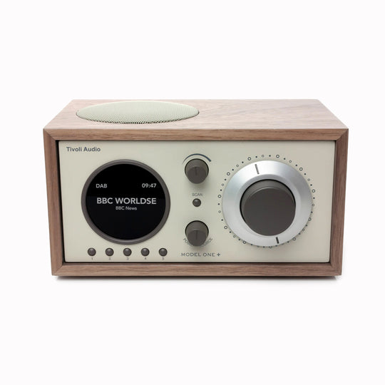 The Model One+ offers a sophisticated blend of classic design and modern audio technology, perfectly suited for any setting. This versatile table radio provides comprehensive listening options, including crystal-clear DAB/DAB+ digital radio, traditional FM, and convenient Bluetooth connectivity for wireless streaming.