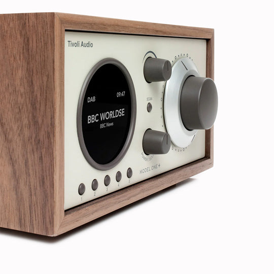 The Model One+ offers a sophisticated blend of classic design and modern audio technology, perfectly suited for any setting. This versatile table radio provides comprehensive listening options, including crystal-clear DAB/DAB+ digital radio, traditional FM, and convenient Bluetooth connectivity for wireless streaming.