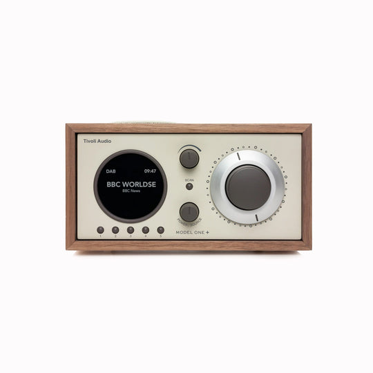 The Model One+ offers a sophisticated blend of classic design and modern audio technology, perfectly suited for any setting. This versatile table radio provides comprehensive listening options, including crystal-clear DAB/DAB+ digital radio, traditional FM, and convenient Bluetooth connectivity for wireless streaming.