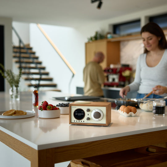 The Model One+ offers a sophisticated blend of classic design and modern audio technology, perfectly suited for any setting. This versatile table radio provides comprehensive listening options, including crystal-clear DAB/DAB+ digital radio, traditional FM, and convenient Bluetooth connectivity for wireless streaming.
