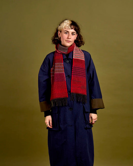 The Walton scarf is an artful mixture of textures and pattern, where graphic dots, dashes, and zigzags interplay. This is all emphasised by colour and contrast.