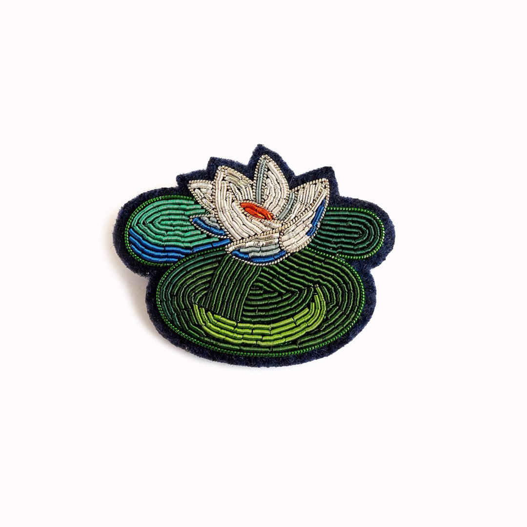 Hand-embroidered Water Lily lapel pin by Parisian fashion accessory brand Macon et Lesquoy.