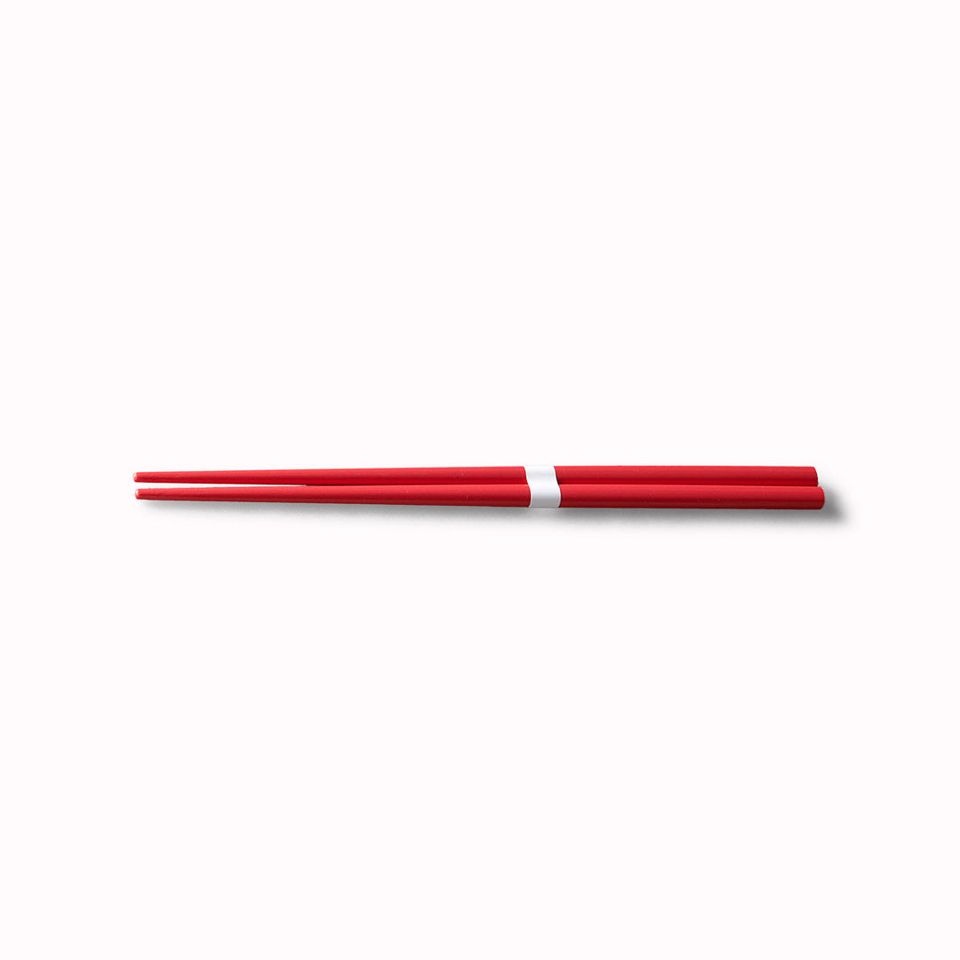 Watermelon Red lacquerware finish with white accent chopsticks from Made in Japan. This Chopstick collection is designed and made at the Zumi workshop in Fukui prefecture, Japan.