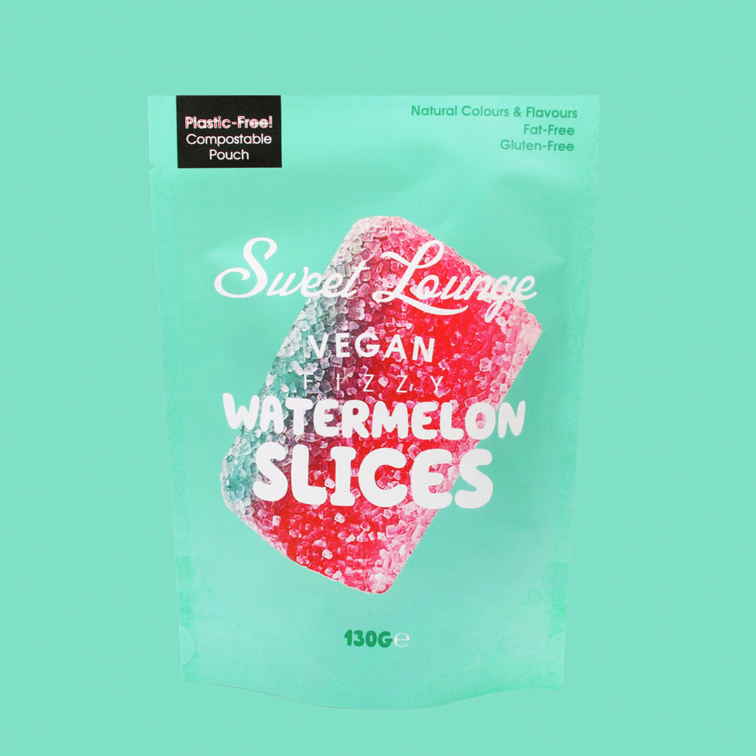Sweet Lounge Vegan Fizzy Watermelon Slices are playful, bite-sized gummies shaped like watermelon wedges, delivering a tart fizzy zing alongside natural fruit sweetness