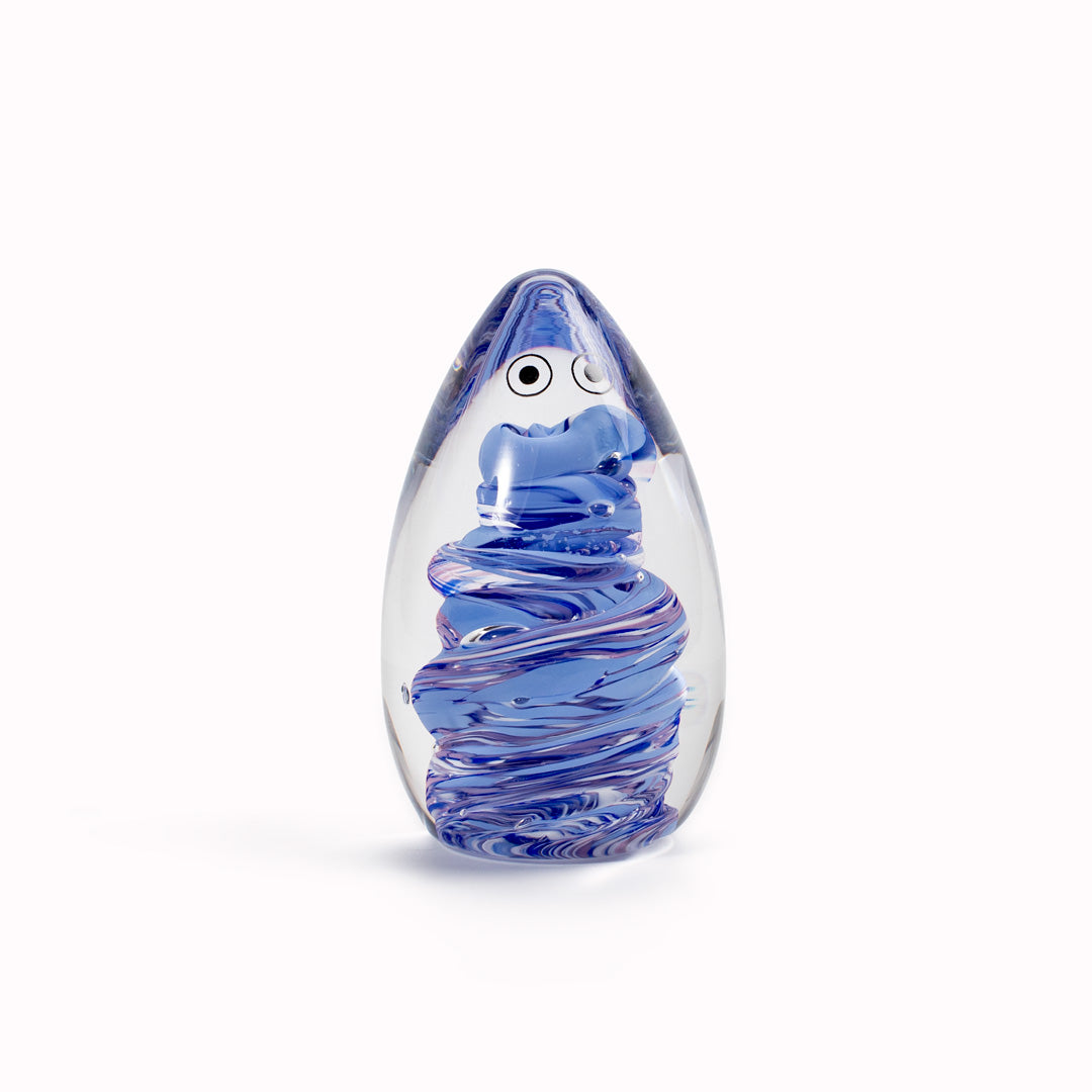 Totem Crystal Blob is formed by dipping and/or rolling molten (hot!) clear glass into smaller chunks of brightly coloured glass droplets,
