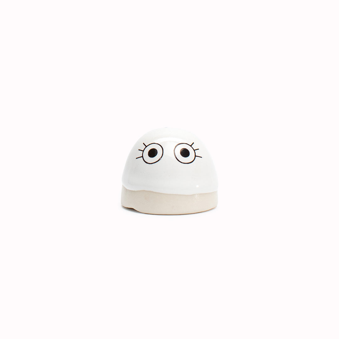 The smallest of the Arhoj decorative ornament figurine family, these tiny little cute dots still have all the personality of their larger siblings. Mostly white or pale with coloured highlights and handmade in Copenhagen, they have all the Arhoj trademarks with their thick multi coloured glazes and Japanese ceramic influence.
