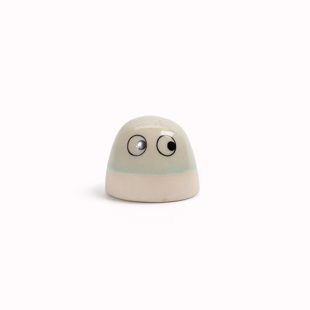 The smallest of the Arhoj decorative ornament figurine family, these tiny little cute dots still have all the personality of their larger siblings. Colourful and handmade in Copenhagen, they have all the Arhoj trademarks with their thick multi coloured glazes and Japanese ceramic influence.