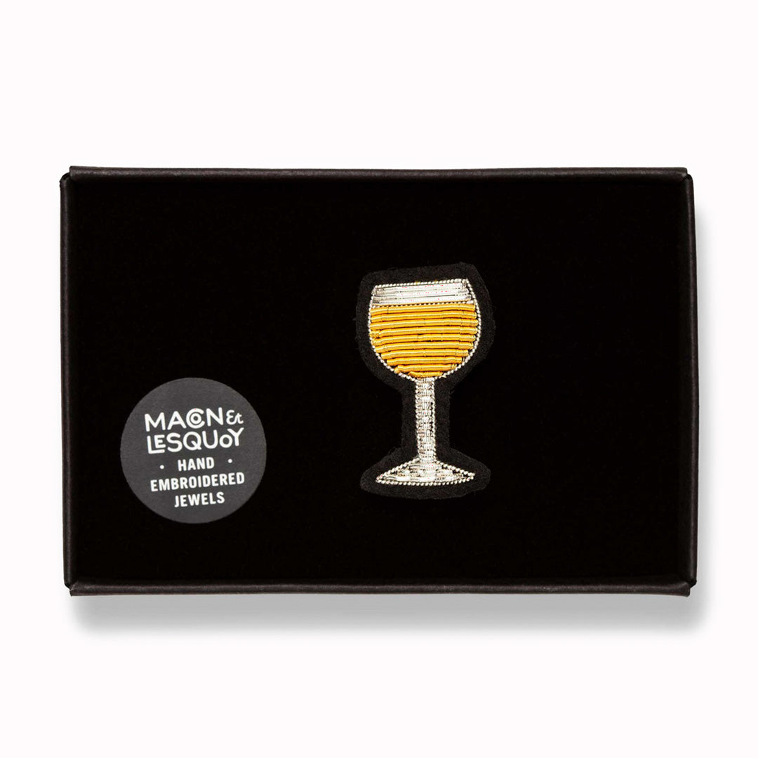 Hand-embroidered White Wine Glass lapel pin by Parisian fashion accessory brand Macon et Lesquoy.