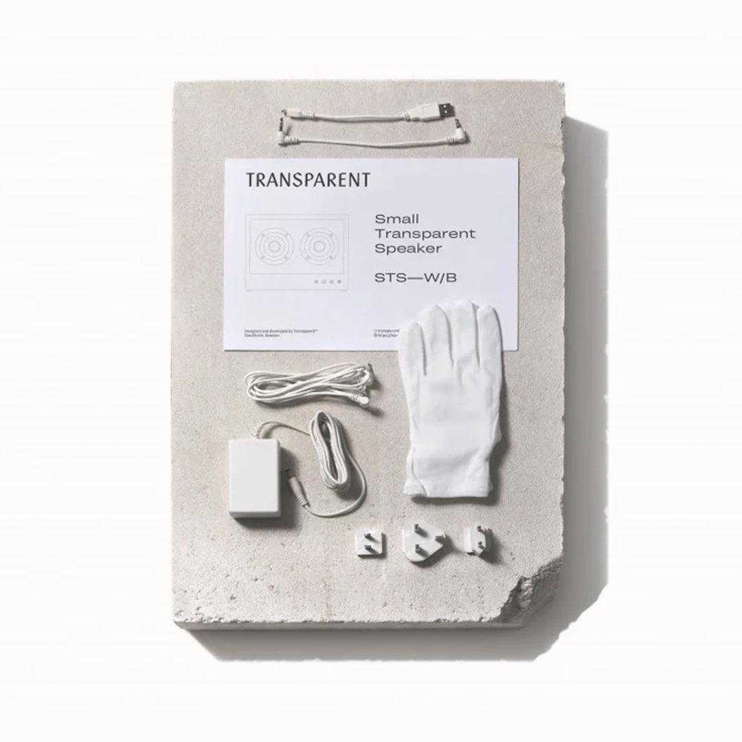 The Transparent Small Transparent Speaker in white is a compact Bluetooth speaker built with the same thinking as good furniture — minimal, functional and made to last.