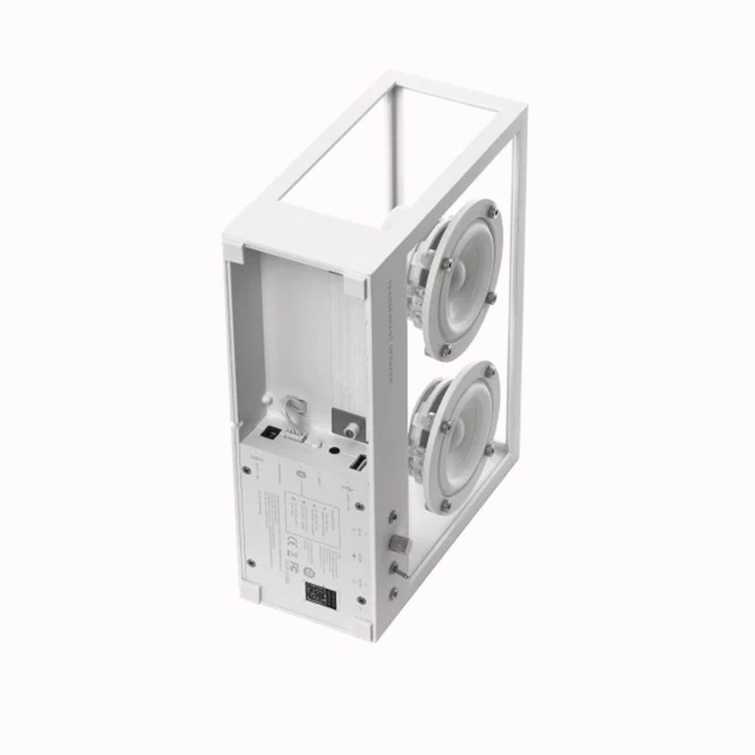 The Transparent Small Transparent Speaker in white is a compact Bluetooth speaker built with the same thinking as good furniture — minimal, functional and made to last.