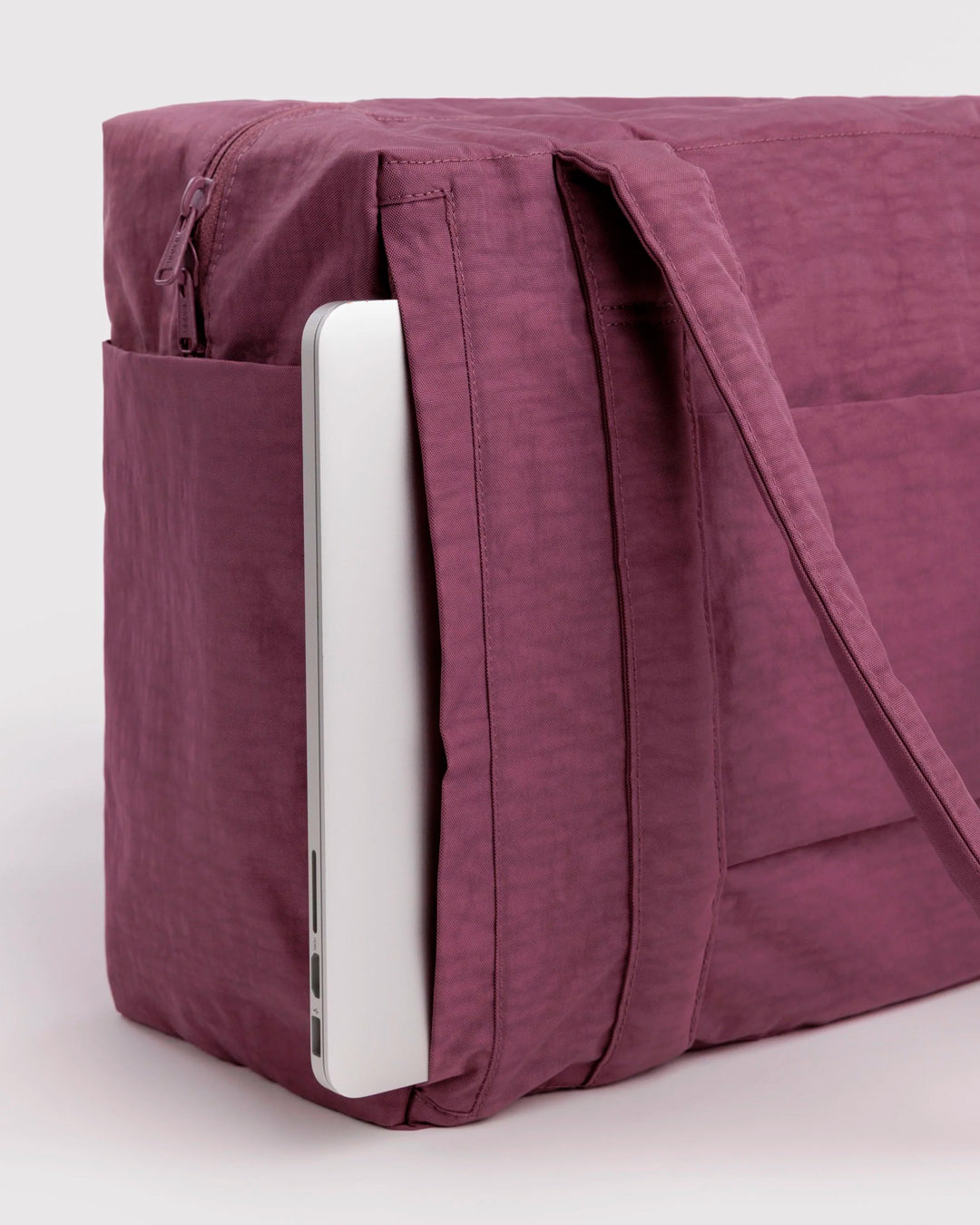 A compact carry-on built around movement. This scaled-down version of BAGGU’s Cloud series keeps the same soft structure, but tightens the proportions for under-seat travel and everyday carry.