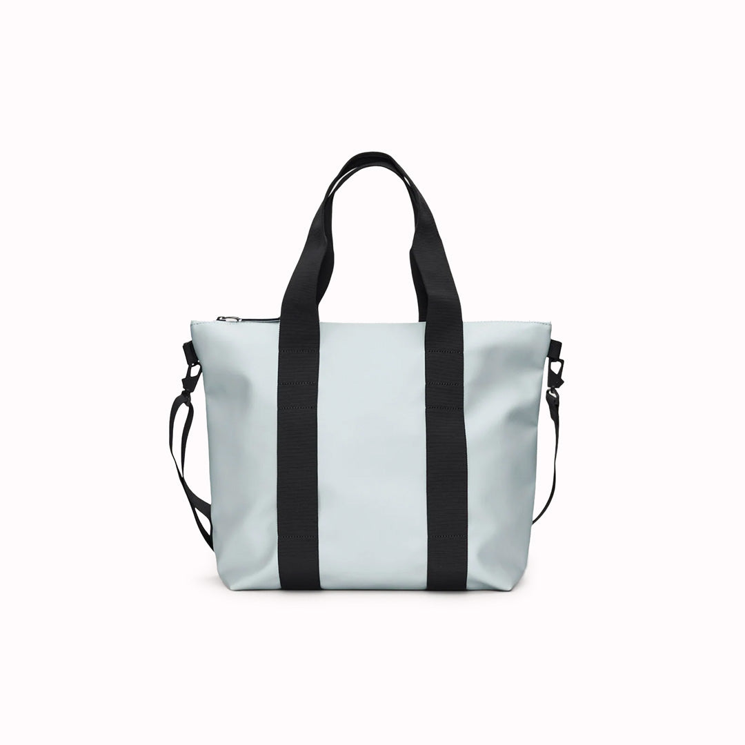Rains' Tote Bag Mini W3 is a waterproof tote bag&nbsp;and an ideal companion for shopping trips&nbsp;as well as commuting to the office.