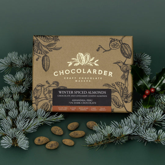 Italian almonds richly coated with 72% dark chocolate from Peru and rolled in cocoa and cinnamon, by award winning craft chocolate maker, Chocolarder. 