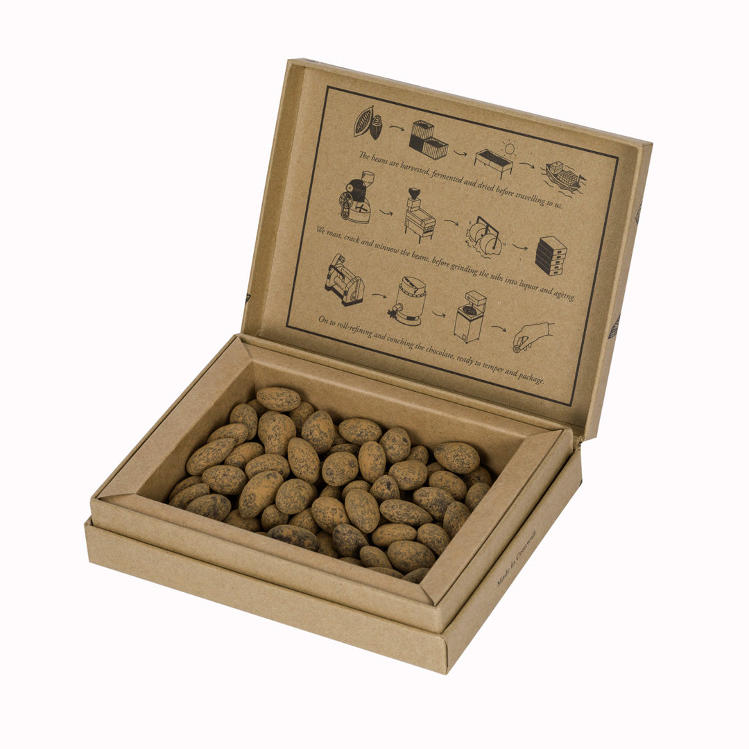 Italian almonds richly coated with 72% dark chocolate from Peru and rolled in cocoa and cinnamon, by award winning craft chocolate maker, Chocolarder. 