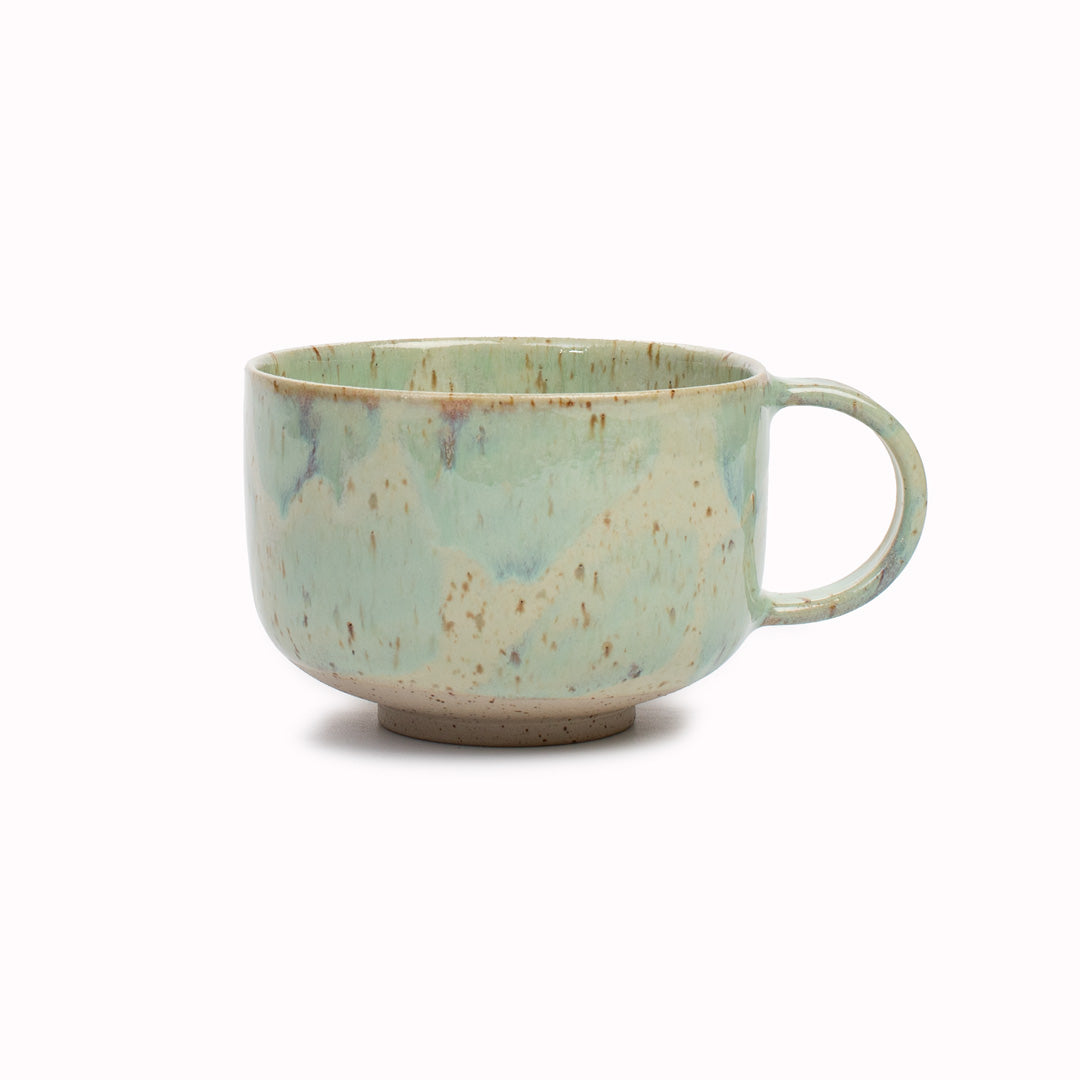 The Whispy Mint Crystal Mion Mug is a large thick glazed stoneware mug, ideal for hot chocolate, soup, long lattes or anyone that likes a BIG cuppa in the morning.