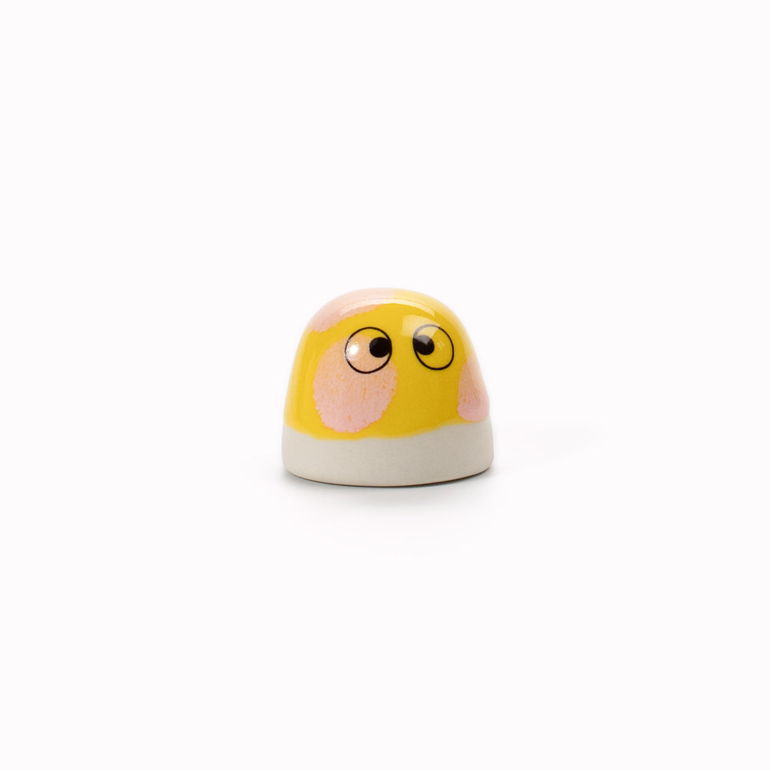 The smallest of the Arhoj decorative ornament figurine family, these tiny little cute dots still have all the personality of their larger siblings. Colourful and handmade in Copenhagen