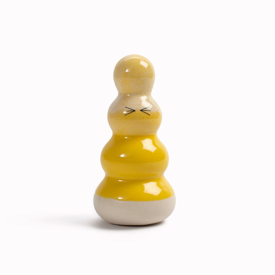 Meet Polo! Polo is a brightly coloured ribbed column and is a hand glazed ceramic figurine created as a close relative of the classic Arhoj Ghost.