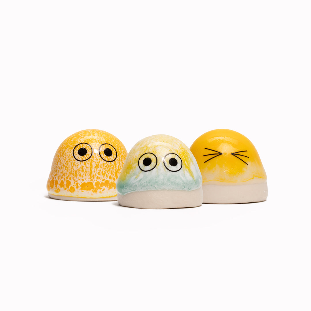 The smallest of the Arhoj decorative ornament figurine family, these tiny little cute dots still have all the personality of their larger siblings. Colourful and handmade in Copenhagen, they have all the Arhoj trademarks with their thick multi coloured glazes and Japanese ceramic influence.