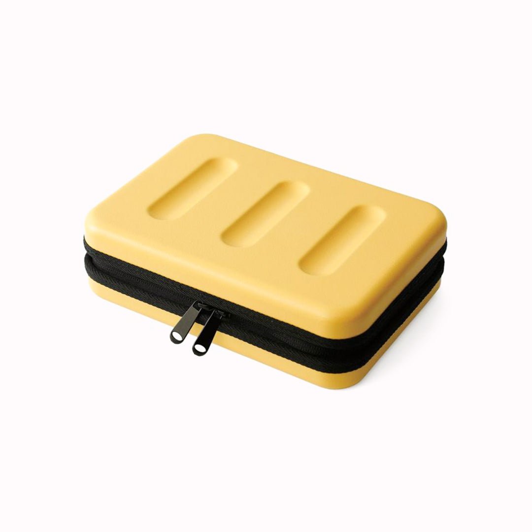 Nahe Hard-Shell Case in bright yellow by Japanese stationery brand Hightide Penco.