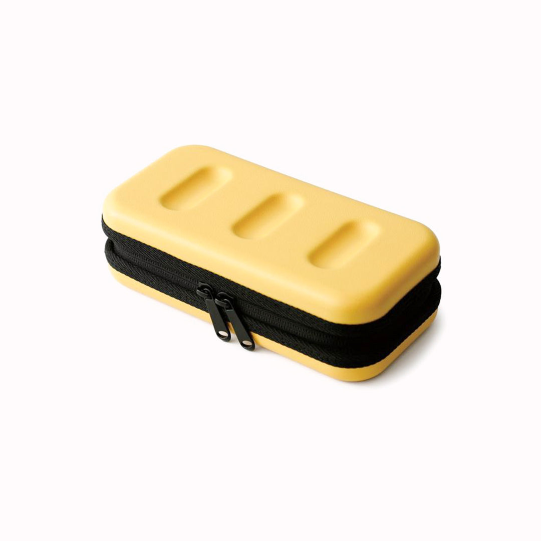 Nahe Hard-Shell Case in bright yellow by Japanese stationery brand Hightide Penco. 