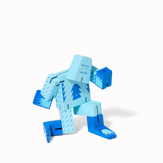 The Cubebot Cryptoids Yeti is a wooden puzzle toy designed by David Weeks. This collectible item is constructed from durable beechwood and elastic
