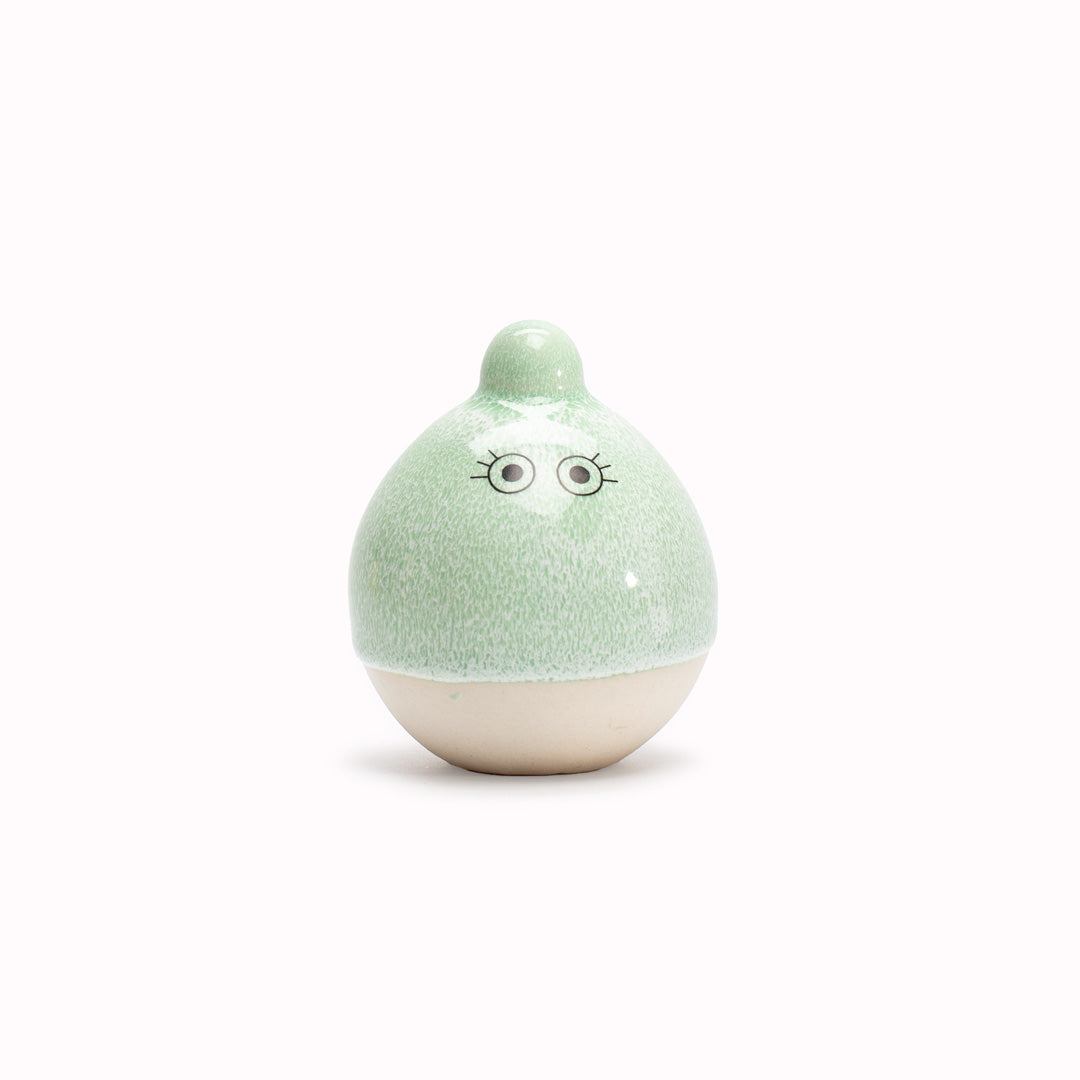 Meet Yoshi! Yoshi is a bubble shaped tiny headed, hand glazed ceramic figurine created as a close relative of the classic Arhoj Ghost.
