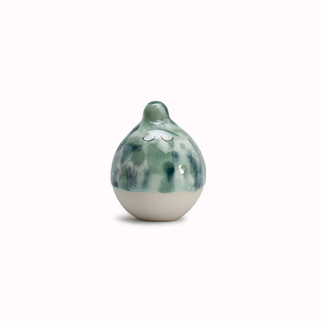 Green Yoshi is a bubble shaped tiny headed, hand glazed ceramic figurine created as a close relative of the classic Arhoj Ghost. The Familia is a continuation of the playful decorative object series from Studio Arhoj. 