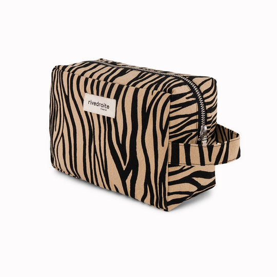 Tournelles XL Wash Bag in Zebra print is from Parisian brand Rive Droite's Wild Tribe collection. A large sized toiletries, make up or wash bag made from recycled cotton. Angled