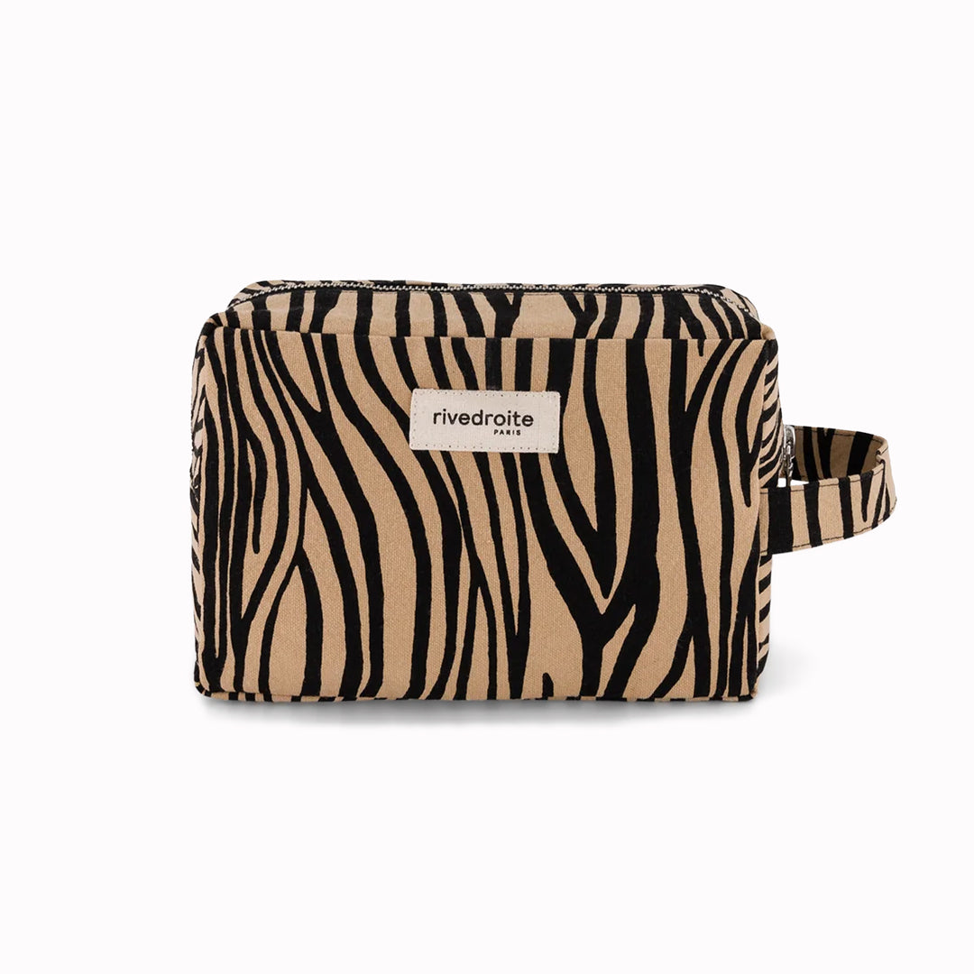 Tournelles XL Wash Bag in Zebra print is from Parisian brand Rive Droite's Wild Tribe collection. A large sized toiletries, make up or wash bag made from recycled cotton.