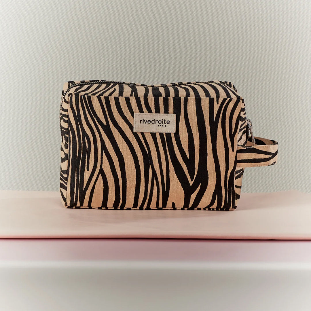 Tournelles XL Wash Bag in Zebra print is from Parisian brand Rive Droite's Wild Tribe collection. A large sized toiletries, make up or wash bag made from recycled cotton. Lifestyle
