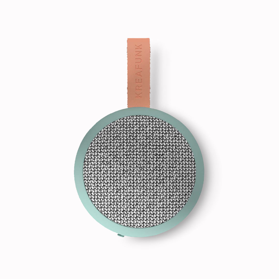 aGo-2 Fabric bluetooth speaker in Dusty-Green colour. Top Down photo on white by KREAFUNK