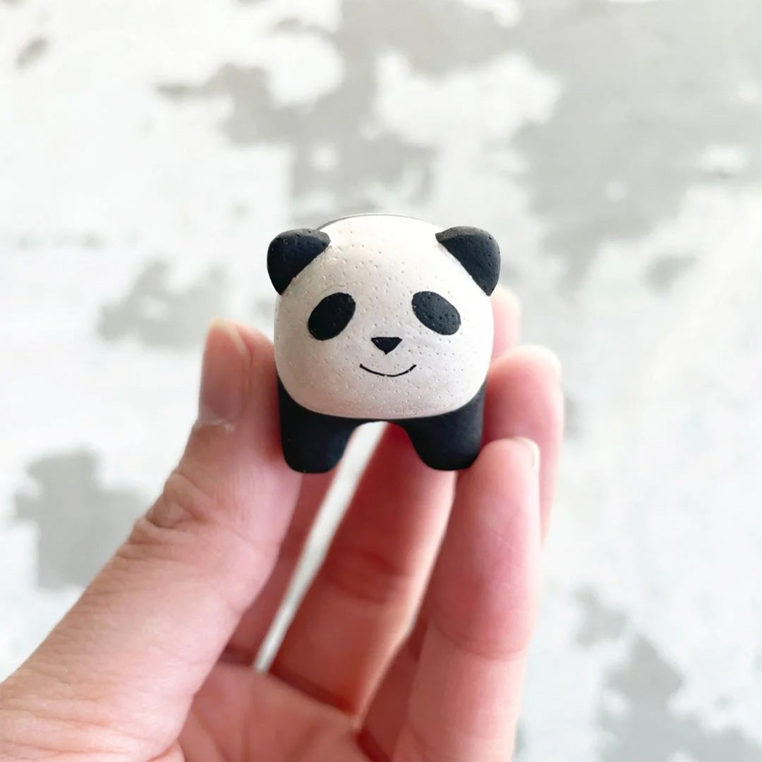 Handmade wooden Baby Panda detail from the Pole Pole collection by Japanese brand T-Lab.