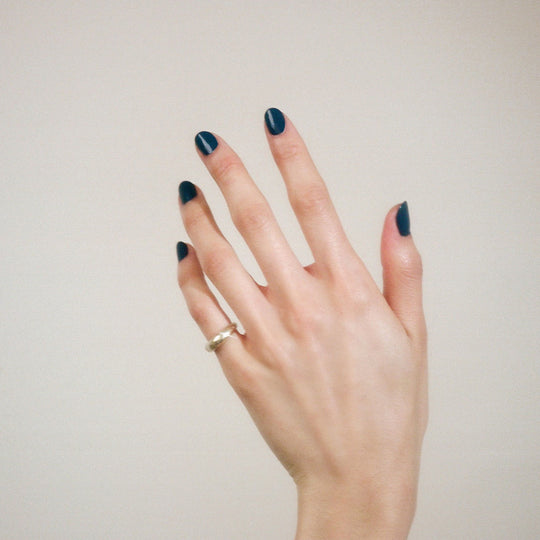 Blue Nudes nail polish as seen on model by J.Hannah is a rich midnight inky blue, inspired by the works of Henri Matisse.